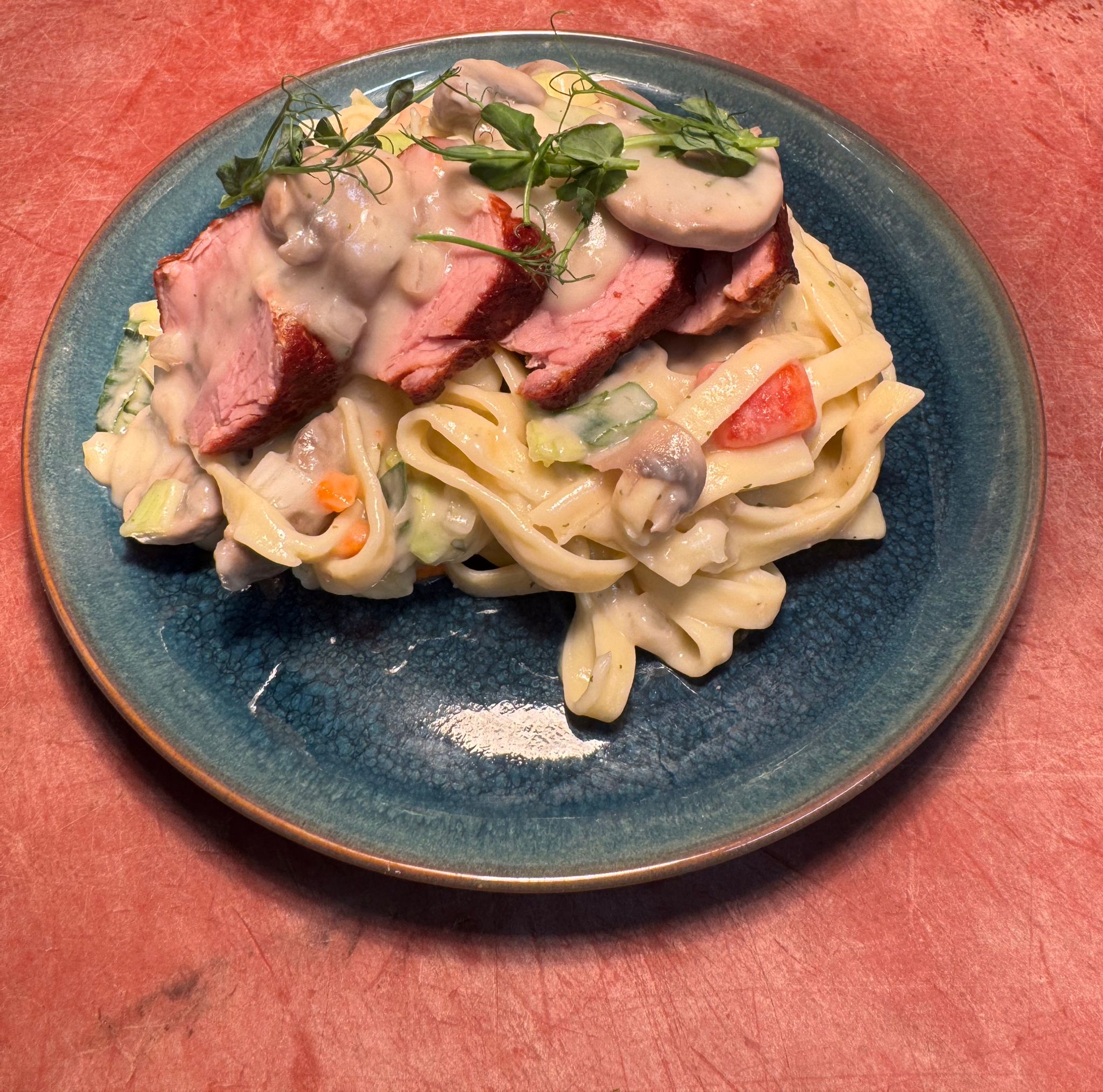 Tagliatelle met varkenshaas en champignonroomsaus